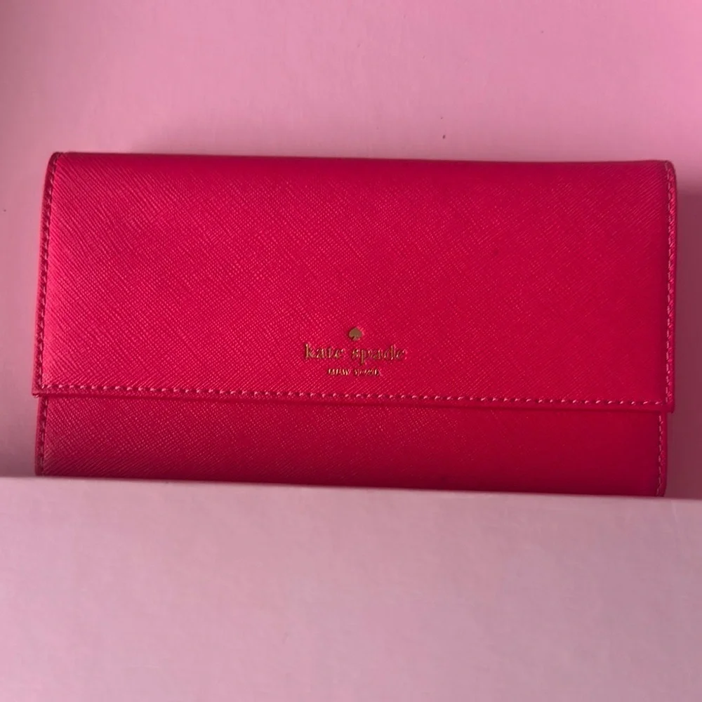 Kate Spade Pink Wallet Sleek Fold-Over Design (Inside plastic is stained)
